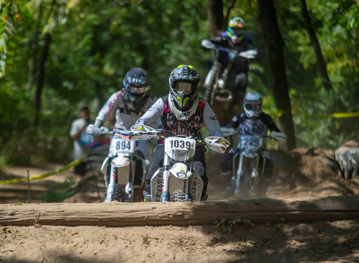 May be an image of 3 people, motorcycle, dirt bike and text